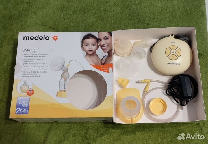 Молокоотсос medela swing электрический