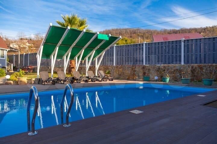 Коттедж 208 м² на участке 11 сот.