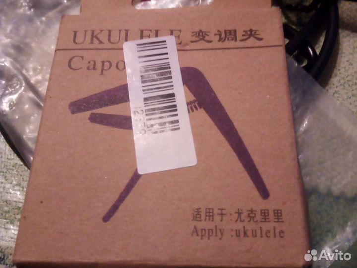 Каподастер универсальный