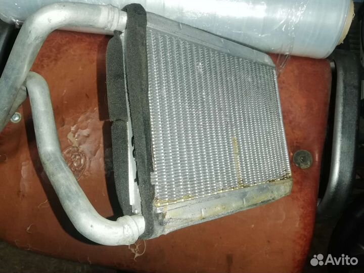 Радиатор печки Джили Эмгранд EC-7