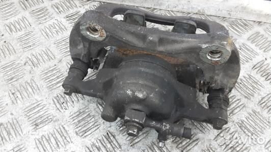 Суппорт тормозной передний левый chevrolet trax (9