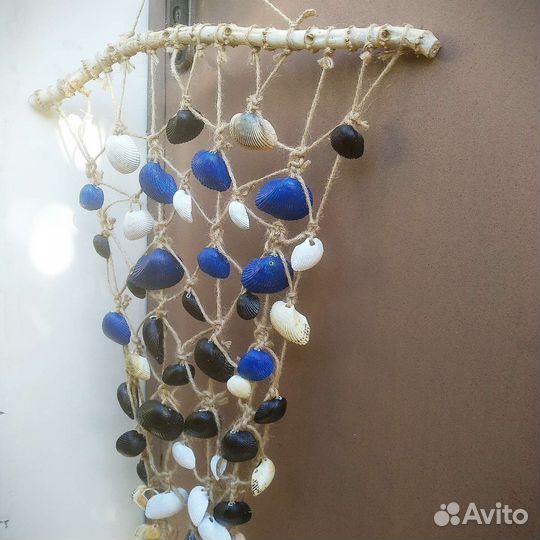 Пано из ракушек на палочке бамбука