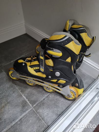 Роликовые коньки