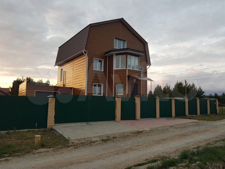 Коттедж 340 м² на участке 15 сот.