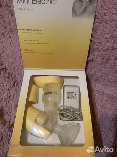 Молокоотсос medela электрический