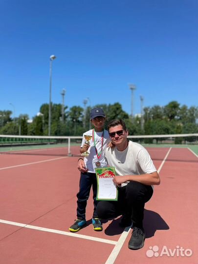 Тренер по большому теннису