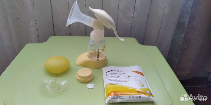 Молокоотсос medela ручной