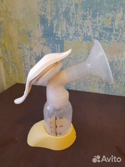 Молокоотсос medela ручной