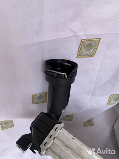 Интереклер правый VAG 7P0145804B