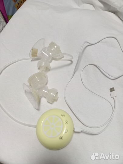 Молокоотсос medela электрический