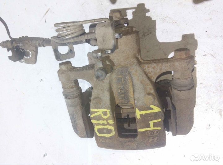 Суппорт тормозной задний левый KIA RIO QB Solaris