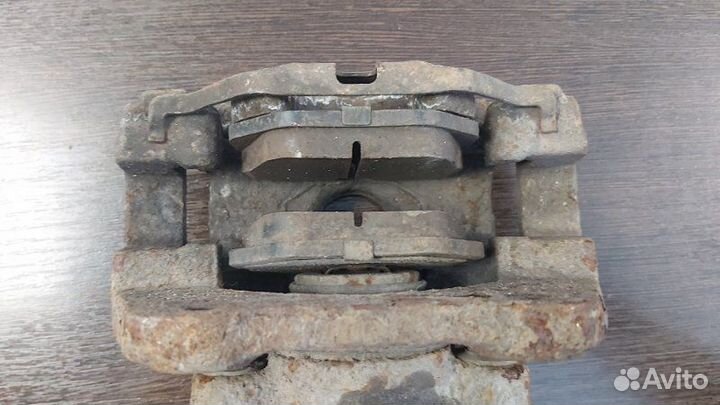 Суппорт тормозной задний левый Bmw X3 2.0D E83 N47