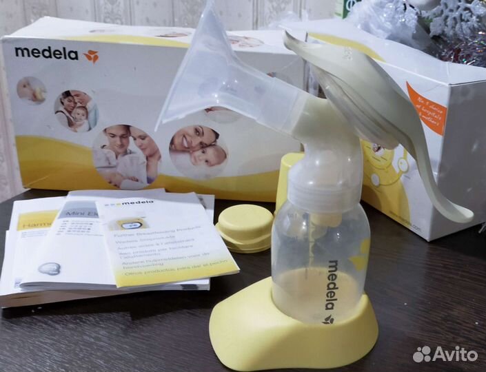 Молокоотсос medela