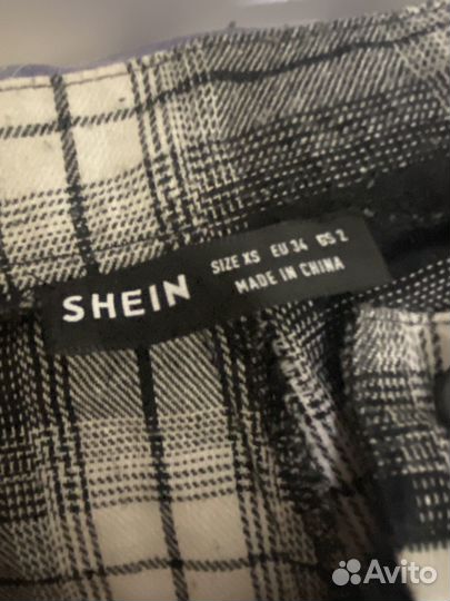 Клетчатые штаны женские