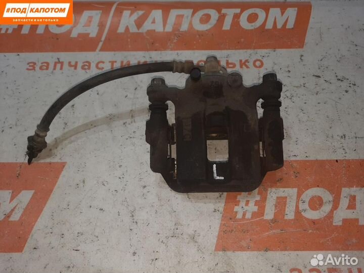 Суппорт тормозной задний левый Nissan X-Trail T31