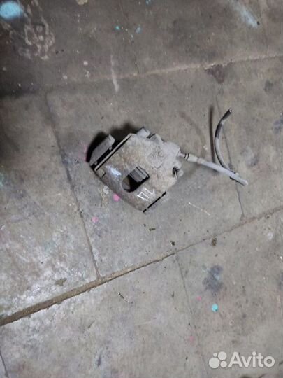 Суппорт тормозной передний левый Ford Fusion