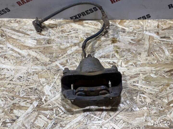 Суппорт тормозной передний левый Hyundai Solaris 1