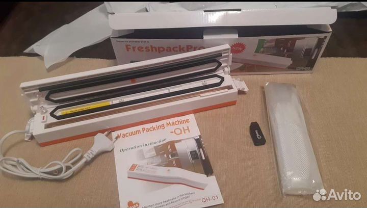 Вакуумный упаковщик новый