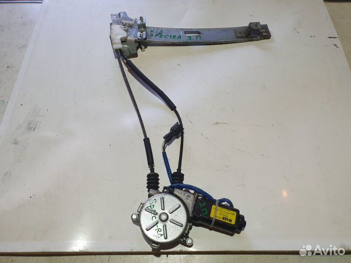 Стеклоподъемник задний правый Kia Spectra седан
