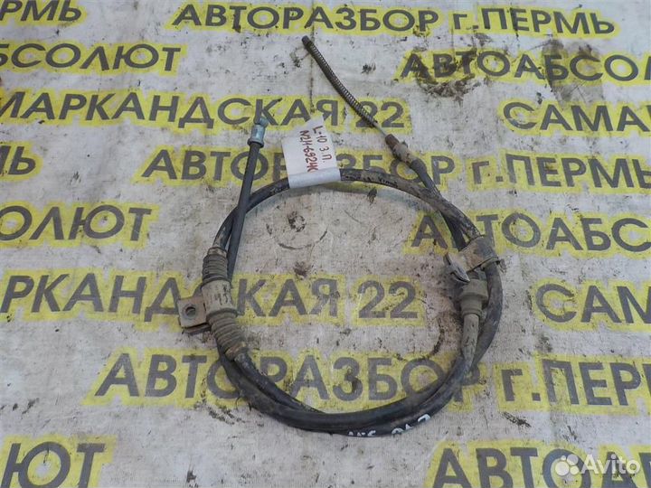 Трос стояночного тормоза Mitsubishi Lancer 10 (CY