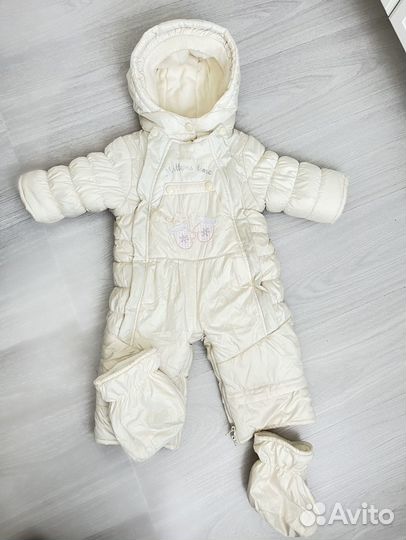Продам зимний комбинезон на девочку как новый