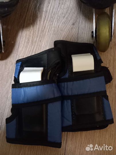 Роликовые коньки