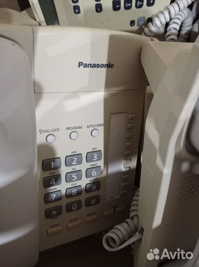 Стационарный телефон panasonic много