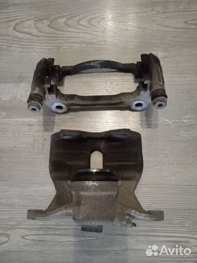 Суппорт передний левый skoda karog