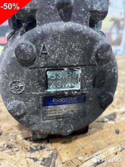 Компрессор кондиционера Киа Спектра