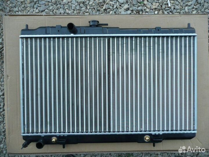 Радиатор двс трубчатый передний Nissan Almera