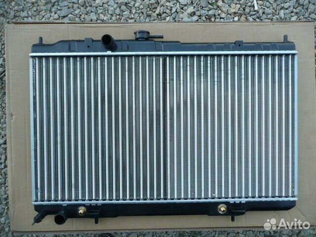 Радиатор двс трубчатый передний Nissan Almera