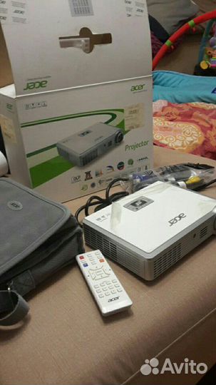 Acer K335