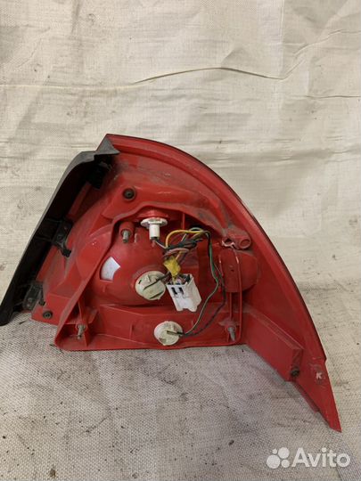 Фонарь левый nissan almera classic