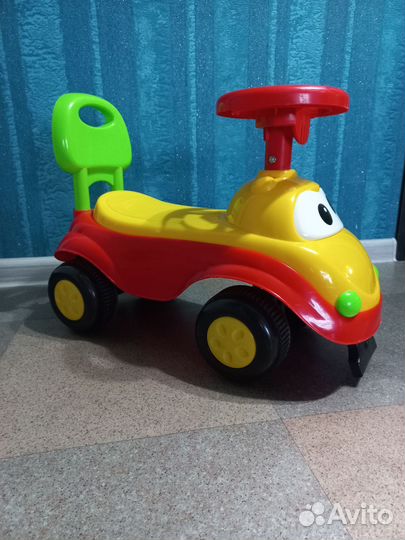 Машинка каталка толокар