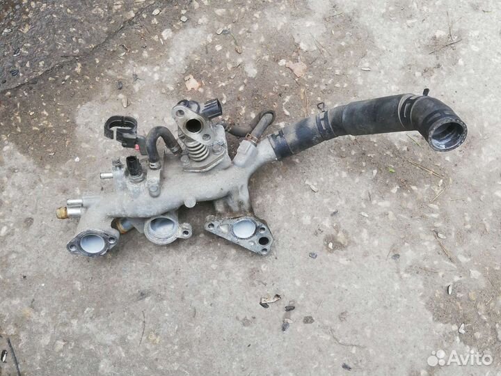 Корпус термостата на митсубиси аутлендер 3.0