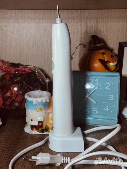 Электрическая зубная щетка philips
