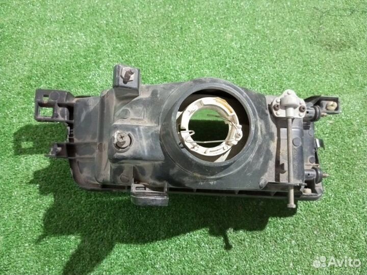 Фара галогеновая левая Toyota Corolla AE91