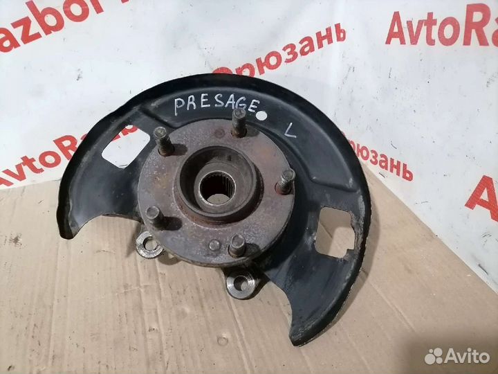 Передний левый поворотный кулак Nissan Presage