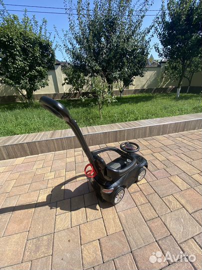 Машинка каталка с ручкой