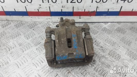 Суппорт тормозной задний левый mazda CX-7 1 (KUK08