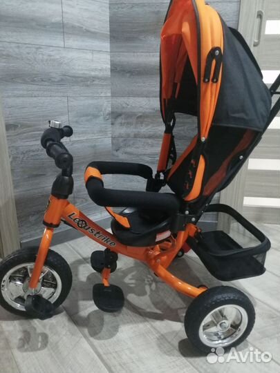 Детский трехколесный велосипед с ручкой