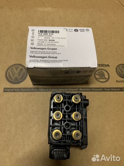 Блок клапанов пневмоподвески VW Touareg NF 2 7P