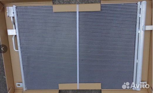 Радиатор кондиционера на Шевроле Траверс