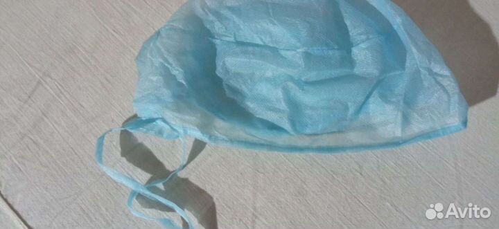 Простыни шапочки халаты одноразовые нетканый матер