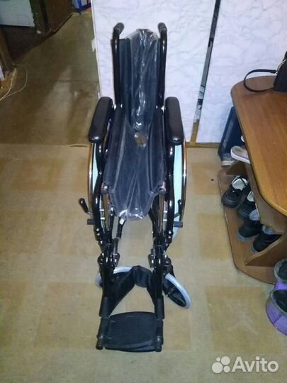 Инвалидное кресло