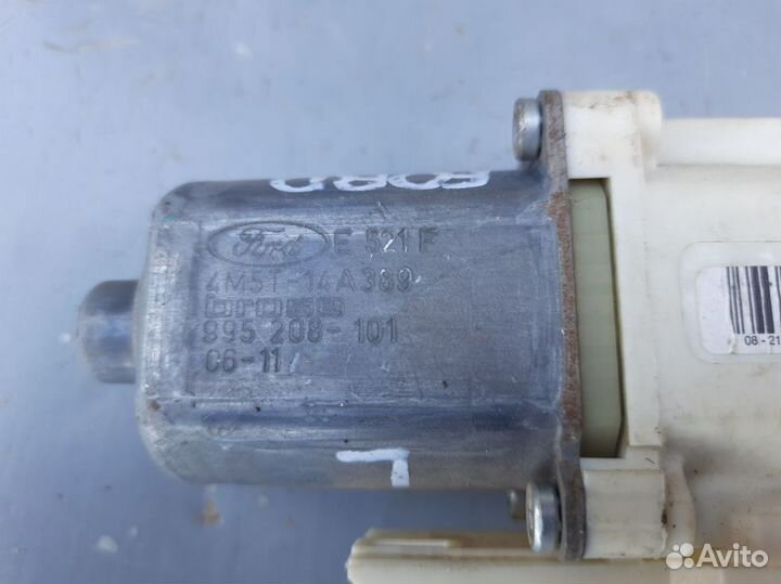 Моторчик левого стеклоподъемника Форд Фокус 2