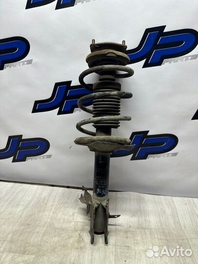 Стойка подвески передняя левая Nissan Almera N16