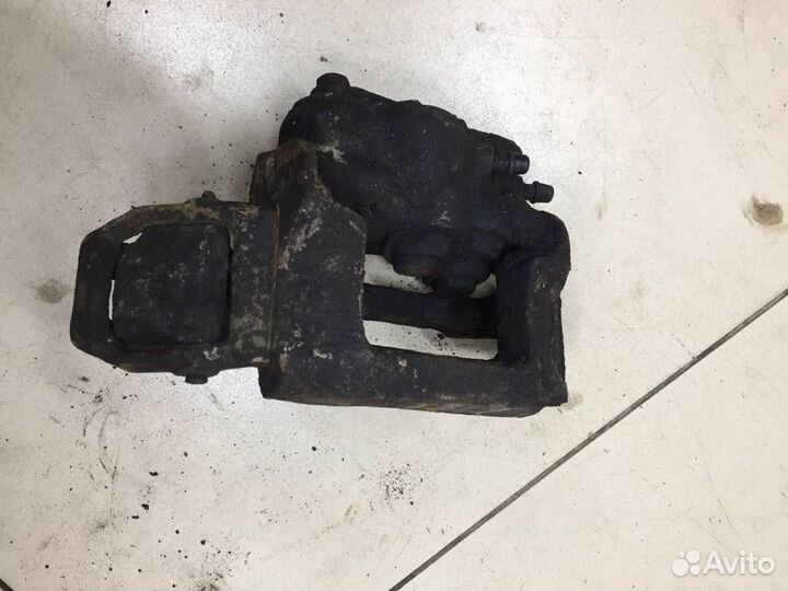 Суппорт передний левый Chevrolet Niva