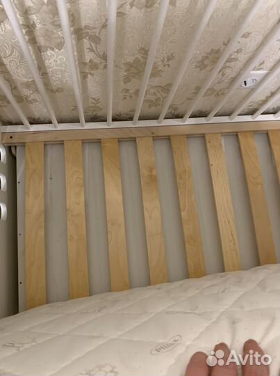 Детская кроватка с поперечным маятником
