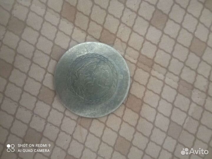 Монета рубль